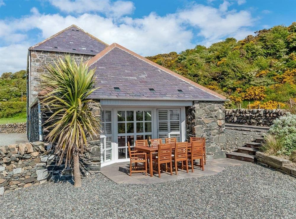 The sitting-out-area is perfect for dining al-fresco at Old Port Store in Stairhaven, near Newton Stewart, Wigtownshire