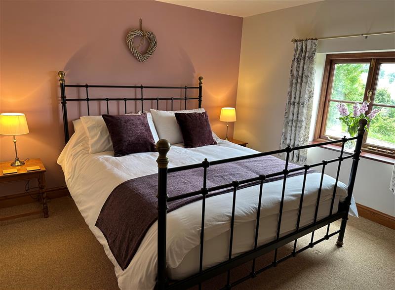 This is the bedroom at Old Post Office Barn, Upper Hulme near Leek