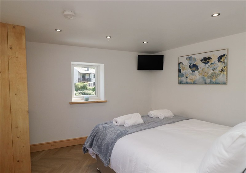 A bedroom in Old Post Office Cottage at Old Post Office Cottage, Backbarrow near Newby Bridge