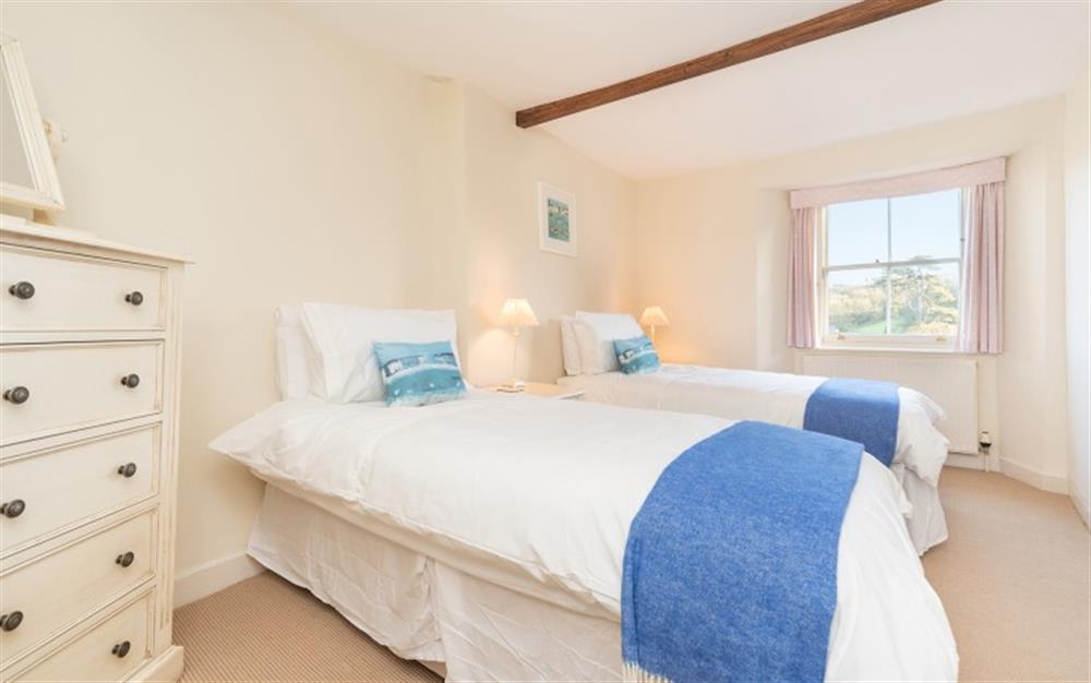 Bedroom 2 can be made up as a twin or superking with views over the village green at Old Post Office in Stokenham