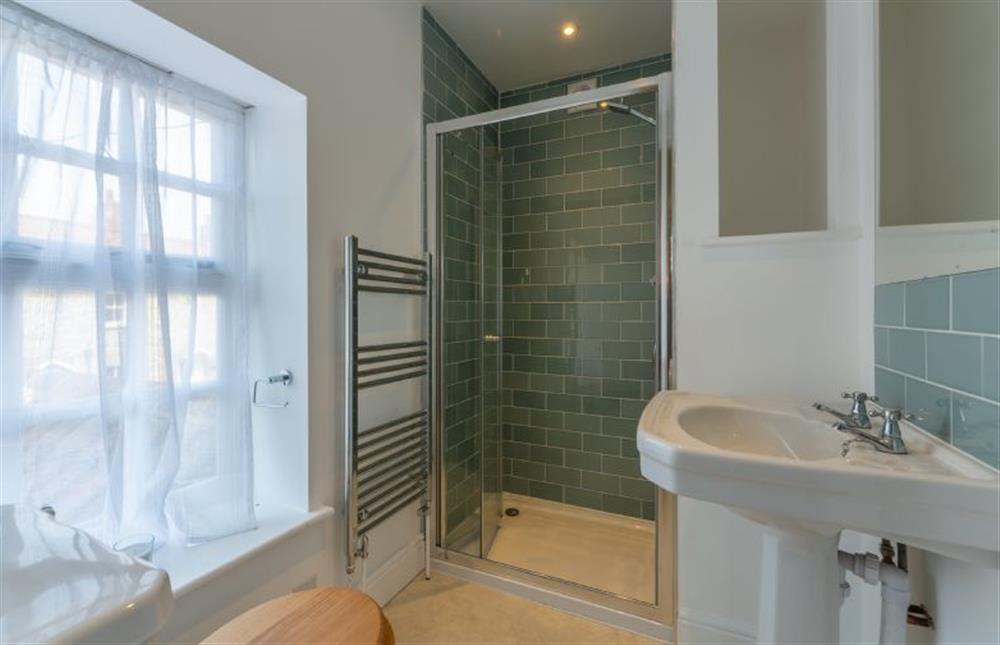 First floor: Master bedroom en-suite shower room at Old Posting, Brancaster Staithe near Kings Lynn