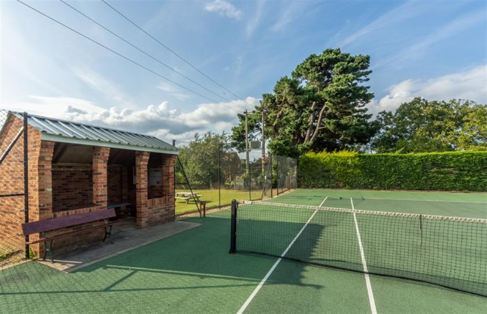 Village tennis courts accessed from the top of the garden at Old Posting, Brancaster Staithe near Kings Lynn