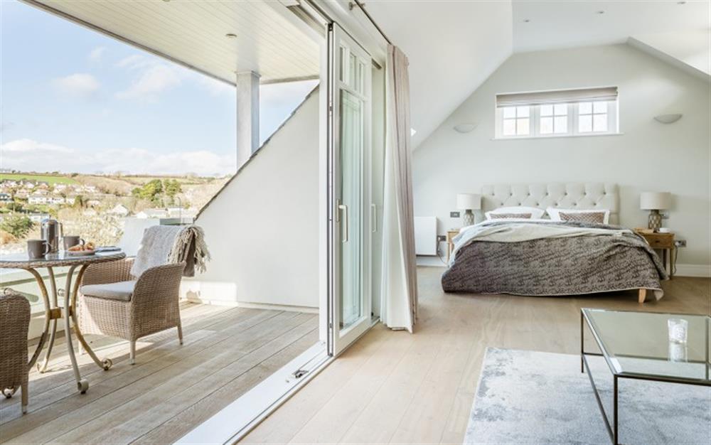 The master suite with views as far as the eye can see! at Old Reservoir House in Noss Mayo