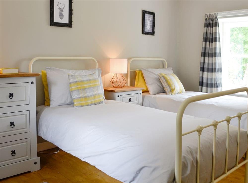 Comfortable twin bedroom at Old School Cottage in Kettins, near Blairgowrie, Perthshire