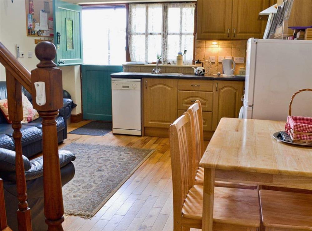 Open plan living/dining room/kitchen (photo 3) at Jasmine Cottage, 