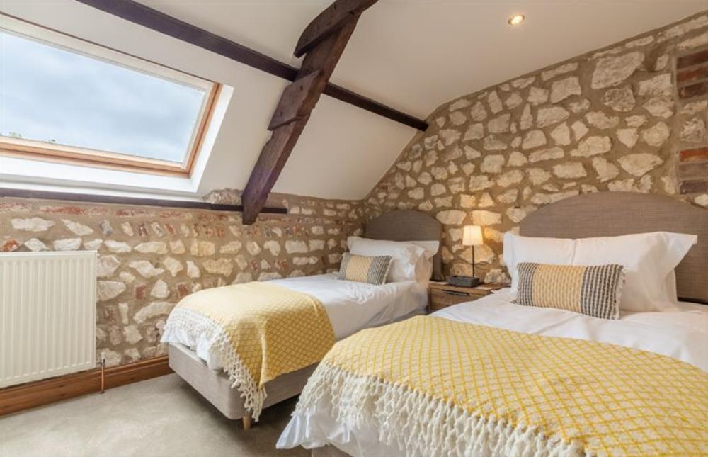 First floor: Bedroom four at Old Smithy, Titchwell near Kings Lynn