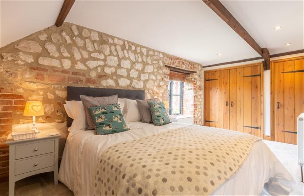 First floor: Master bedroom at Old Smithy, Titchwell near Kings Lynn