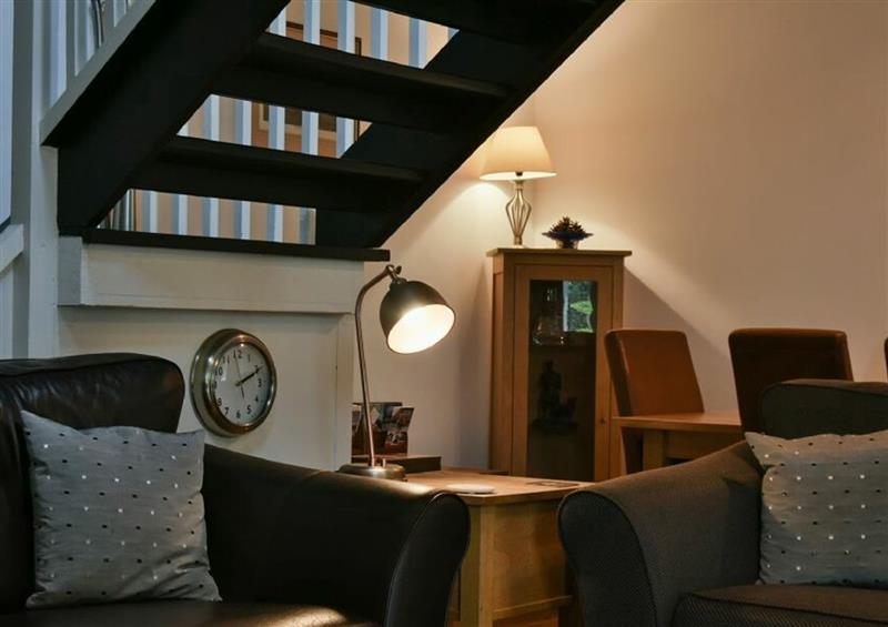 Relax in the living area at Old Stable Cottage, Alnmouth