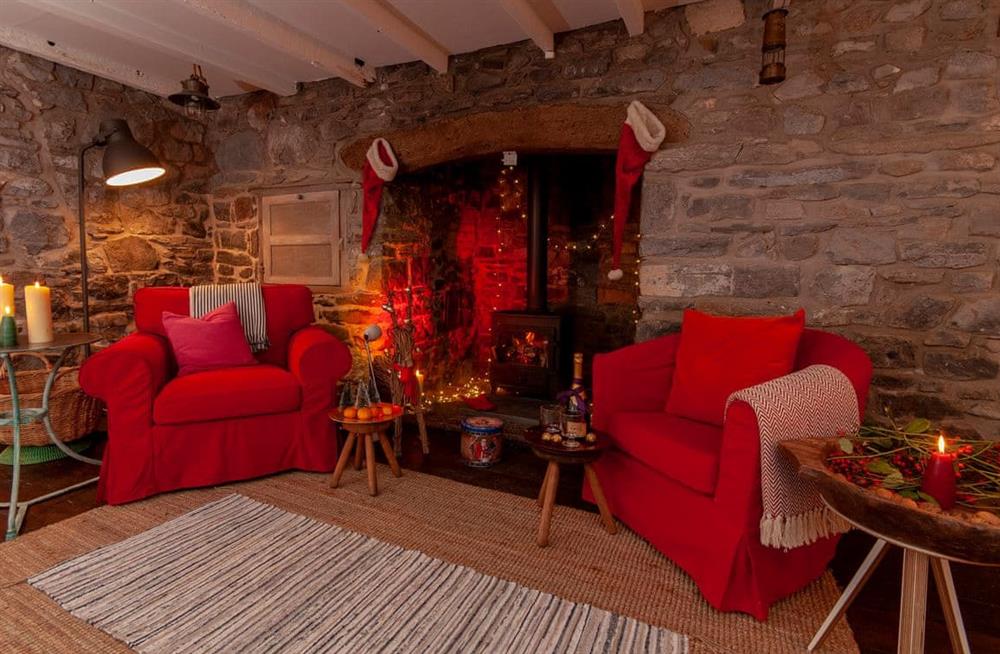 Relax in the living area (photo 3) at Old Stable Cottage in Carew, Pembrokeshire, Dyfed