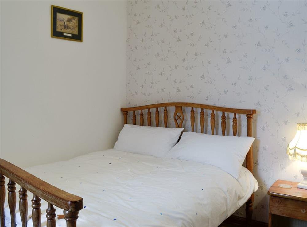 Comfortable double bedroom at Old Stable Cottage in Uplawmoor, near Barrhead, Lanarkshire
