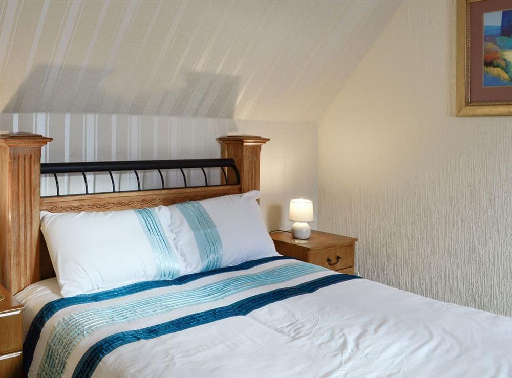 Relaxing double bedroom at Old Stable Cottage in Uplawmoor, near Barrhead, Lanarkshire