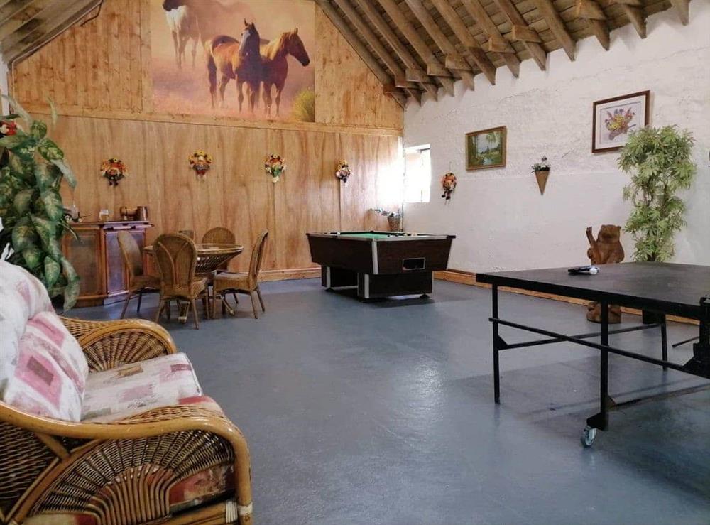 Shared games room at Old Stable Cottage in Uplawmoor, near Barrhead, Lanarkshire