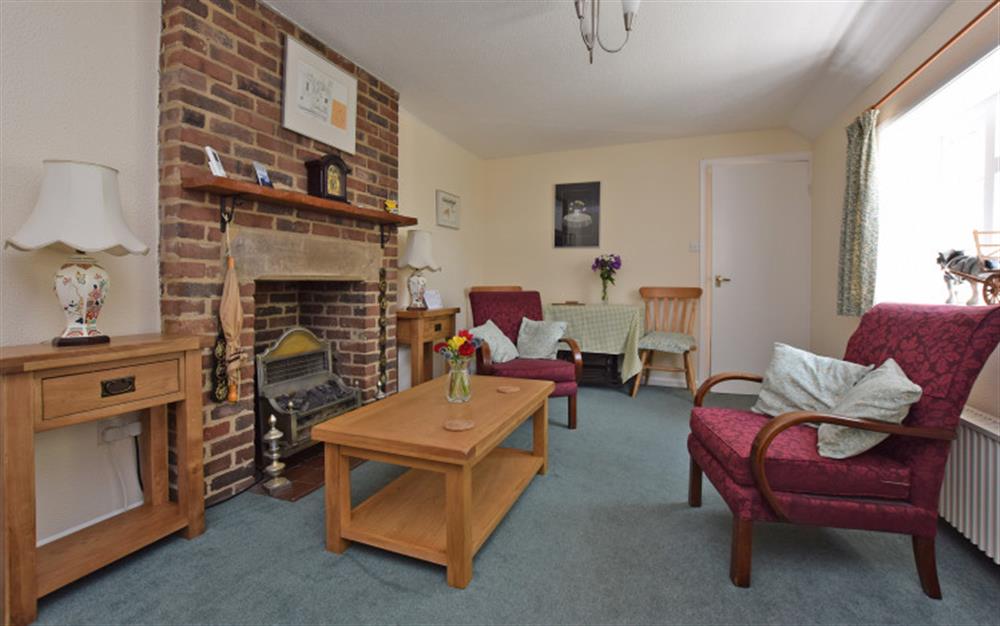 Relax in the living area at Old Stables Cottage in East Boldre