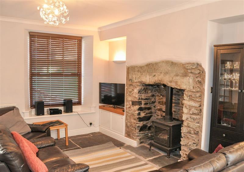 Relax in the living area at Old Stones Cottage, Ambleside