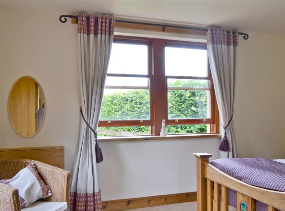 Double bedroom (photo 2) at Old Stones Cottage in Dollar, Clackmannanshire