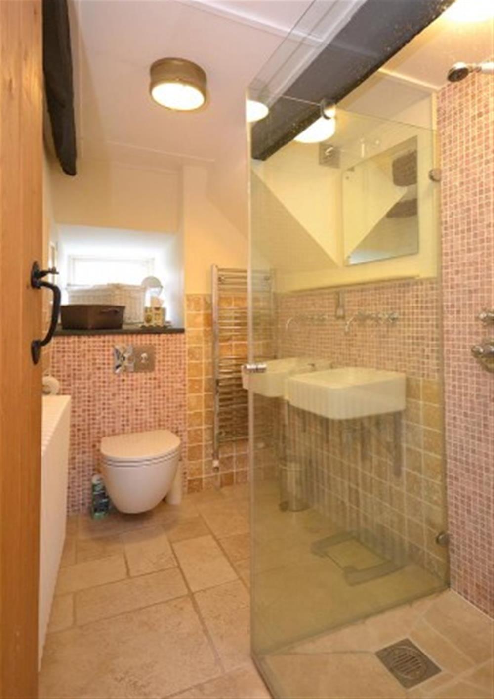The modern ground floor shower room  at Old Thatch in Torcross