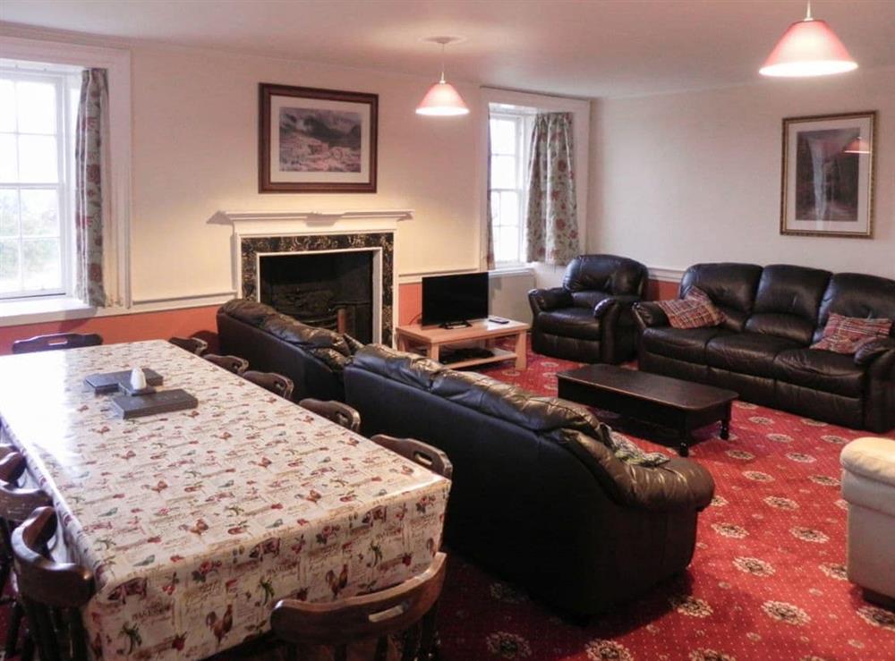 Spacious and comfortable living/dining room at Old West Wing in South Lochaweside, Argyll