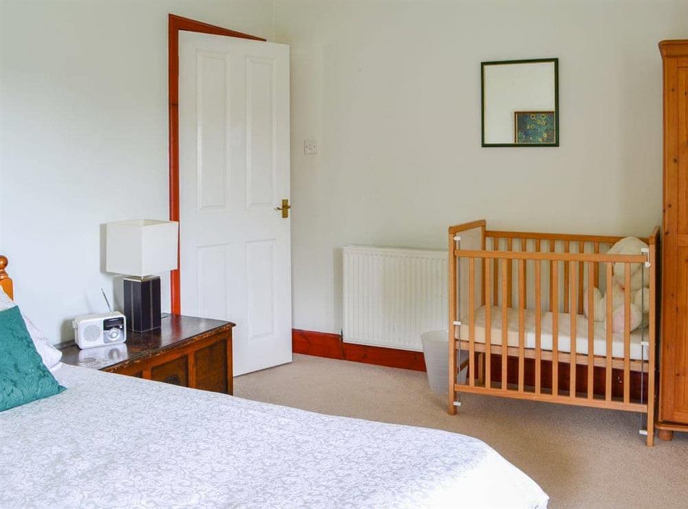 Double bedroom with cot at Oldfield in Westruther, near Lauder., The Scottish Borders