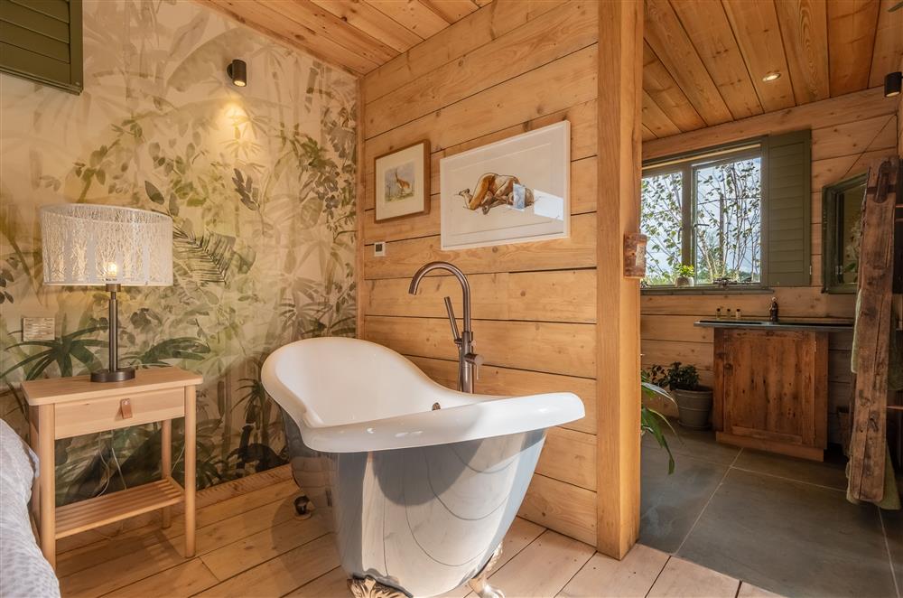 The decadent slipper bath in the bedroom suite at Olive Tree House, Ripe, Lewes