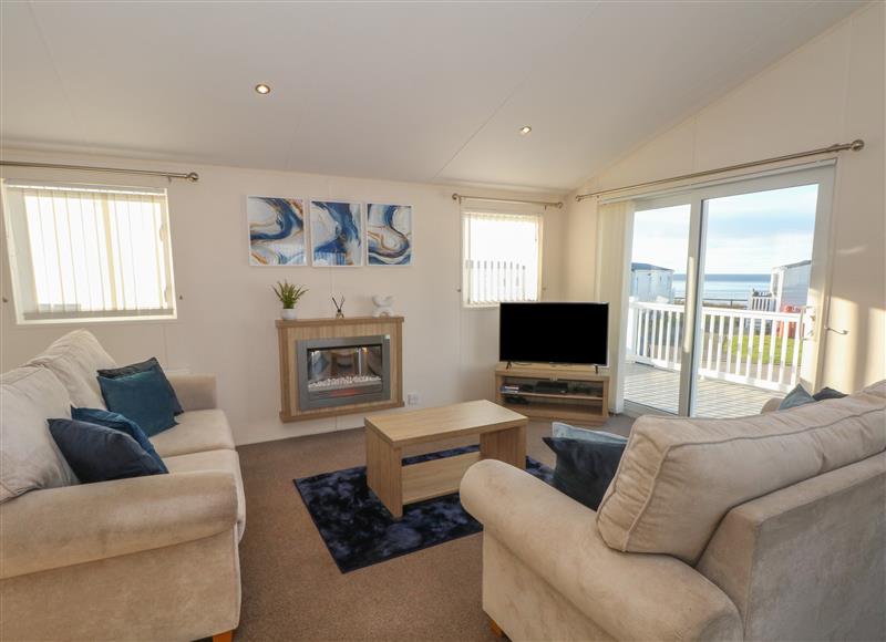 Relax in the living area at Olivias Retreat, Heysham