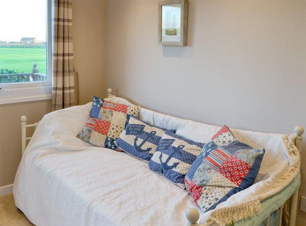 Single bedroom with pull out extra bed - set as single at On The Beach in Bacton, Norfolk