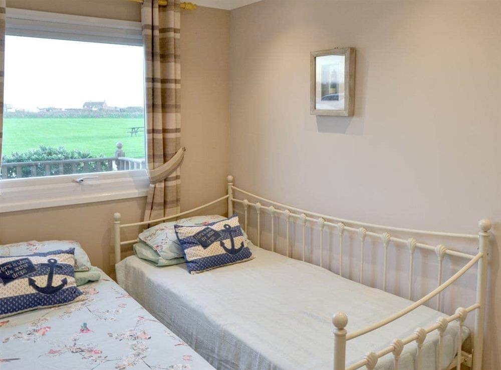Single bedroom with pull out extra bed - set as twin at On The Beach in Bacton, Norfolk