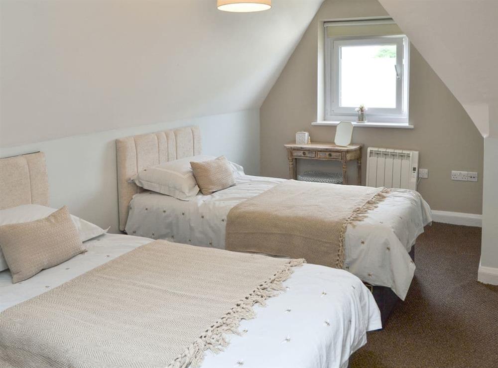 Twin bedroom at On the Green in Shouldham, North Norfolk, England