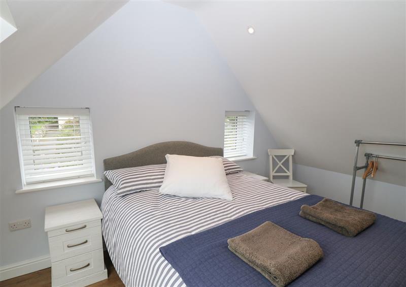 This is a bedroom at One Dolfor, Aberdaron
