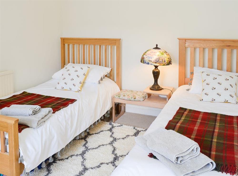 Twin bedroom at Oor Wee Hoose in Whithorn, Wigtownshire