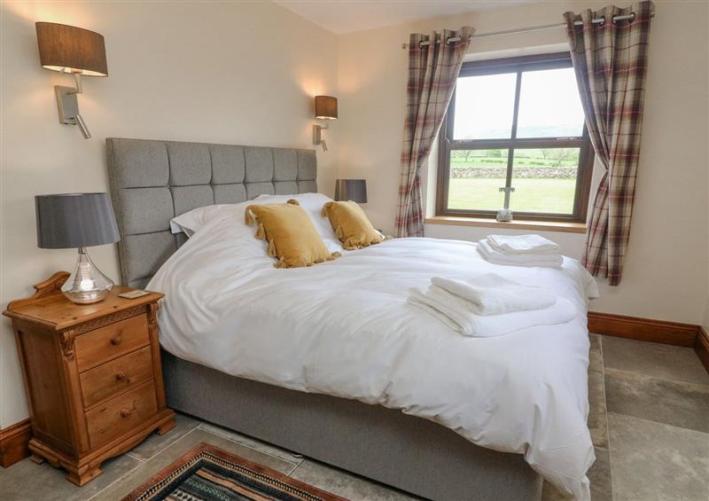 One of the bedrooms at Orcaber Farmhouse, Austwick