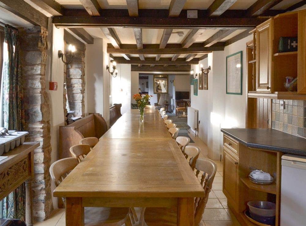 Historic wooden beamed ceiling throughout ground floor areas at Orchard Barn in Bampton, near Tiverton, Devon
