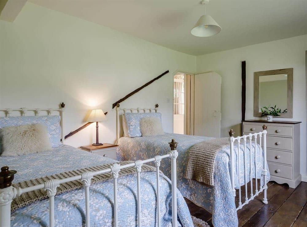 Twin bedroom at Orchard Barn in Meare, near Glastonbury, Somerset