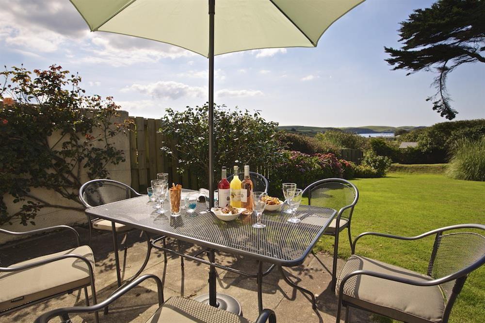 Terrace and garden with outside seating at Orchard Brae in , Thurlestone