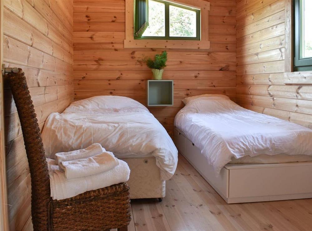 Twin bedroom at Orchard Cabin in Pyecombe, West Sussex