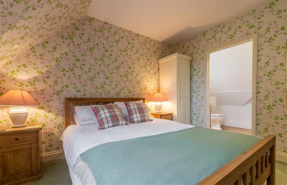 First floor: King-size bedroom (photo 3) at Orchard Cottage, Burnham Thorpe near Kings Lynn