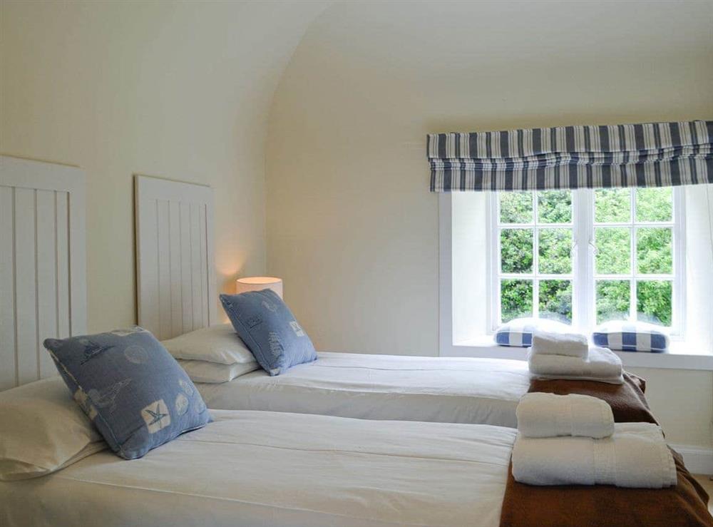Twin bedroom at Orchard Cottage in Garlieston, near Newton Stewart, Wigtownshire