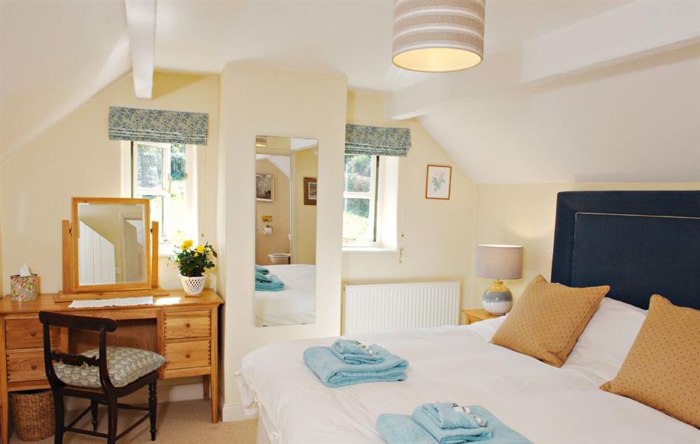Master bedroom with 6’ super king bed at Orchard Cottage (Monmouthshire), Penterry