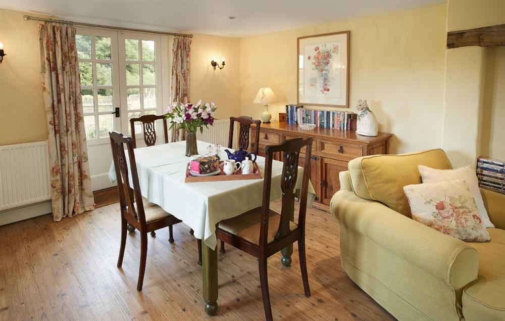 Open plan kitchen, sitting and dining areas with french doors onto the patio (photo 2) at Orchard Cottage (Monmouthshire), Penterry