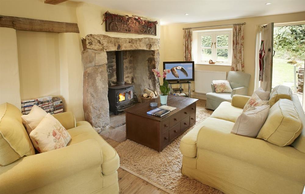Open plan kitchen, sitting and dining areas with french doors onto the patio at Orchard Cottage (Monmouthshire), Penterry