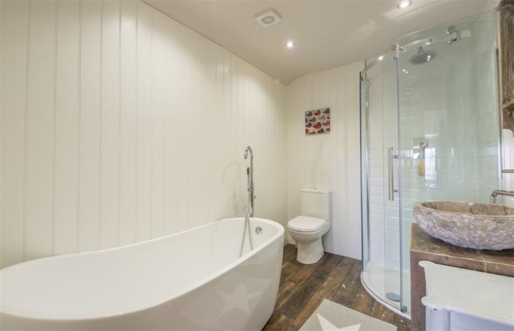 First floor: Bathroom with separate shower cubicle at Orchard Cottage, Ringstead near Hunstanton