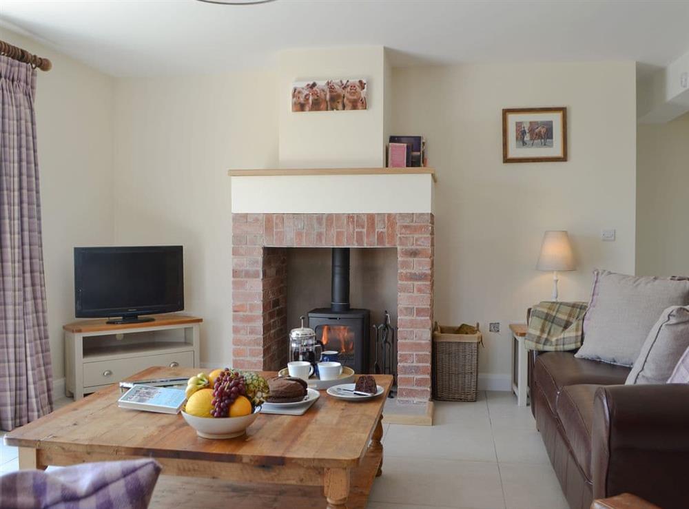 Well presented living room at Orchard Cottage in Upton Cressett, near Ironbridge, Shropshire