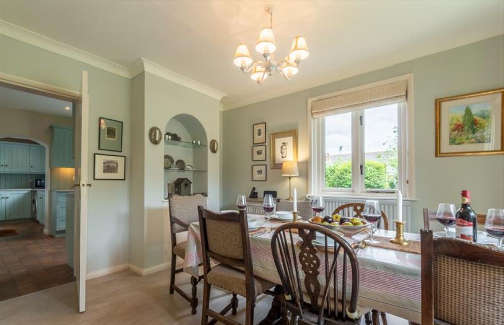 Ground floor: Dining area within the sitting room at Orchard Cottage, Wells-next-the-Sea
