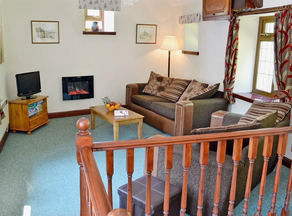 Spacious living room/dining room at Orchard Cottage in Wheddon Cross, Exmoor, Somerset