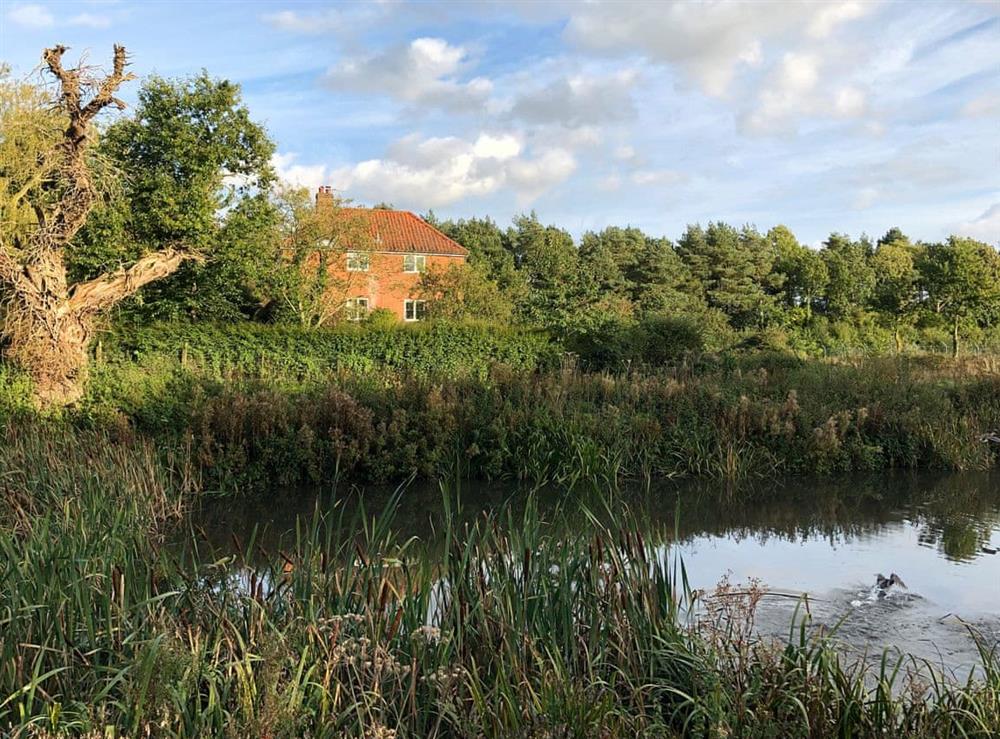 Pond near the property at Orchard House in Hempstead, near Holt, Norfolk