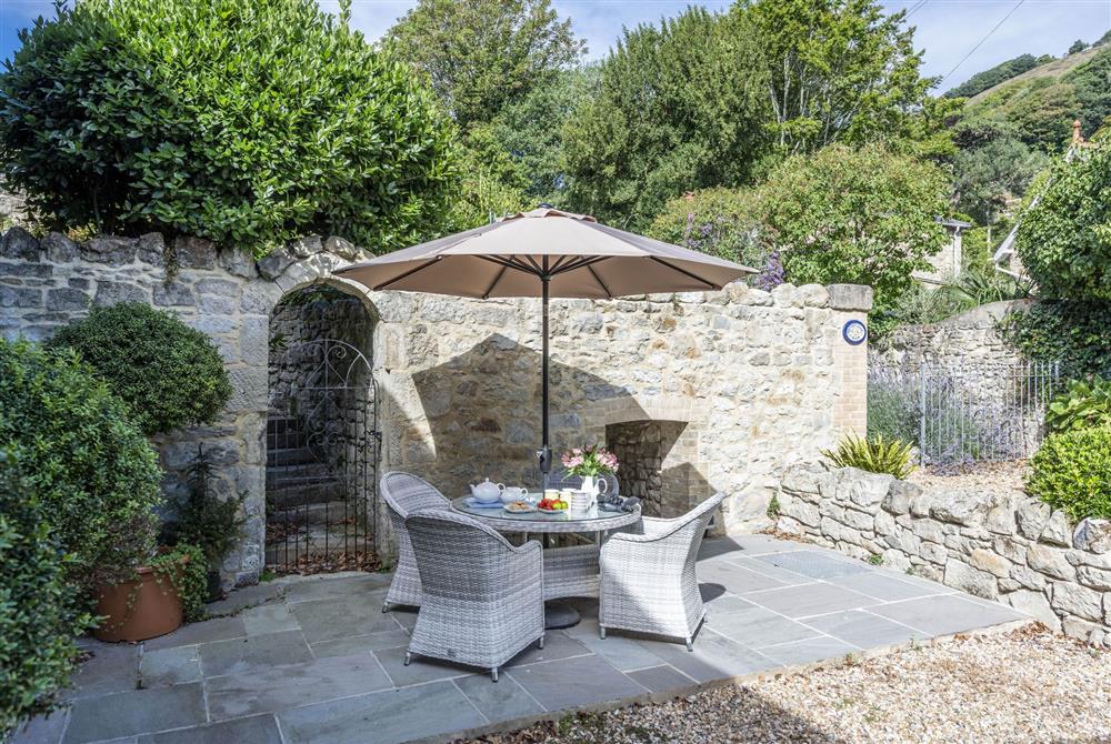 The pretty terrace for al fresco dining at Orchard Leigh Cottage, Ventnor