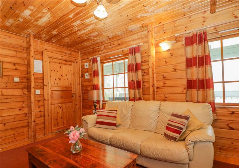 Relax in the living area at Orchard Lodge, Hockworthy near Sampford Peverell