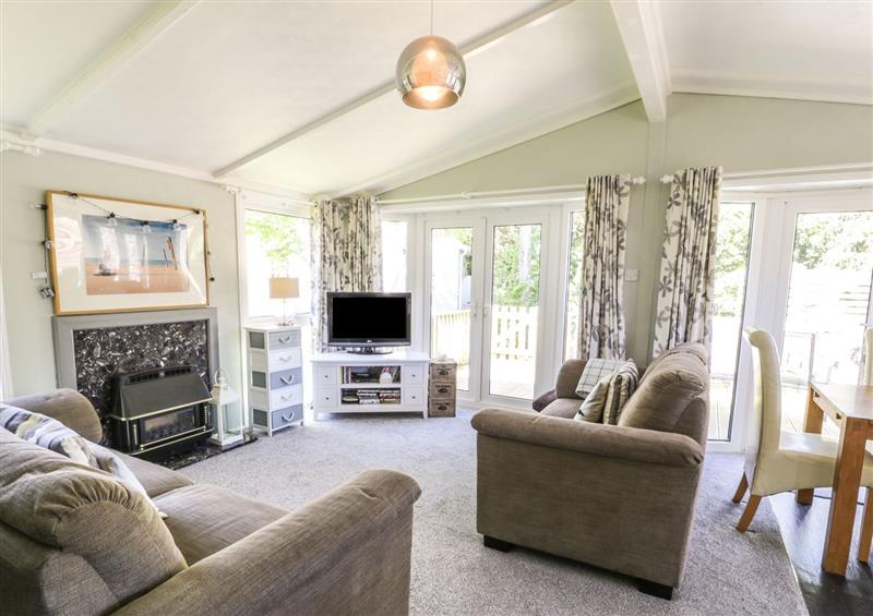 Relax in the living area at Orchard Lodge, Llanengan near Abersoch