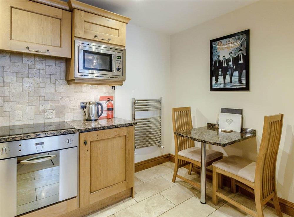 convenient dining area within the kitchen at Orchard Sands in Beadnell, Northumberland