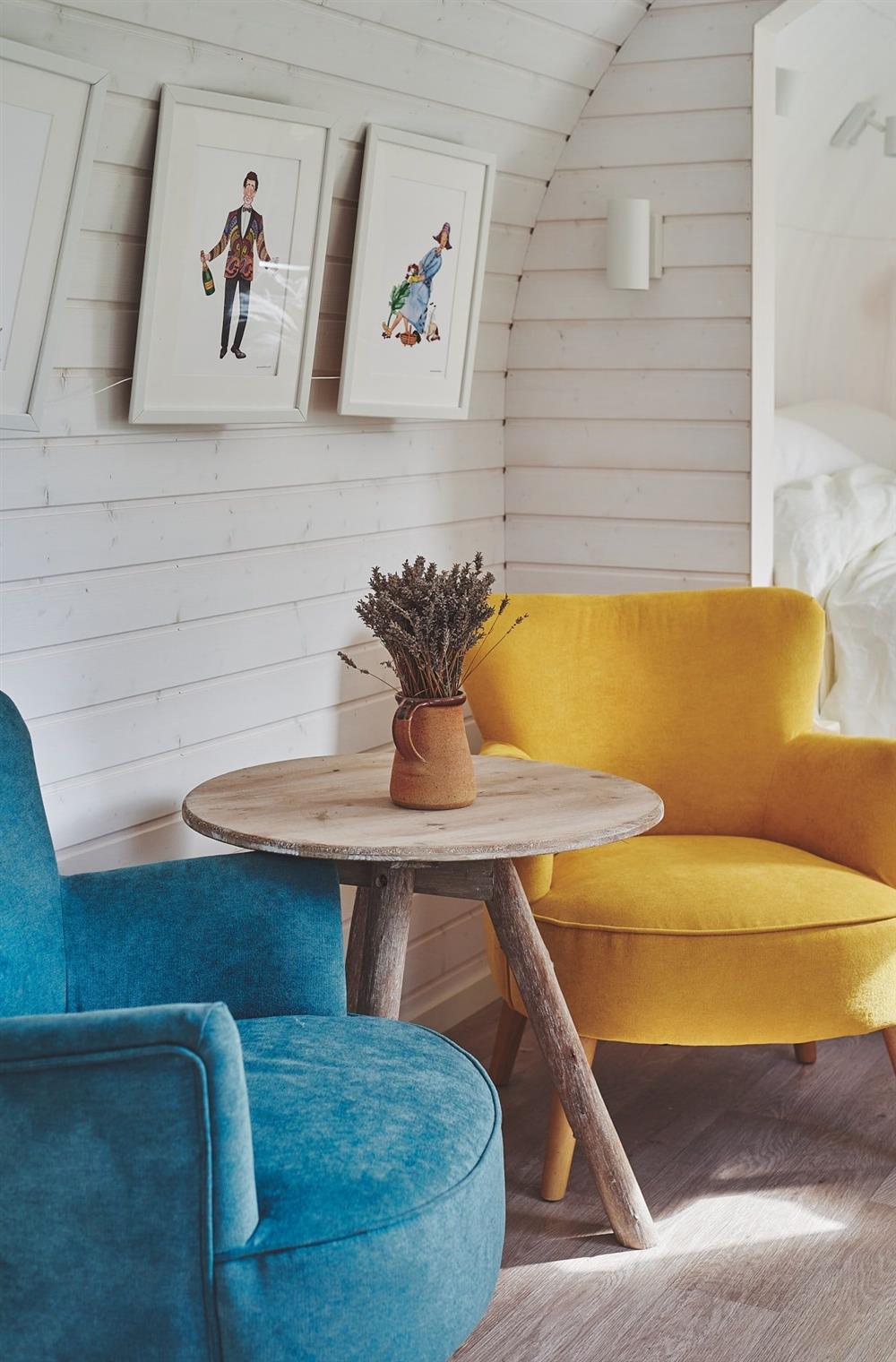 The blue and yellow armchairs