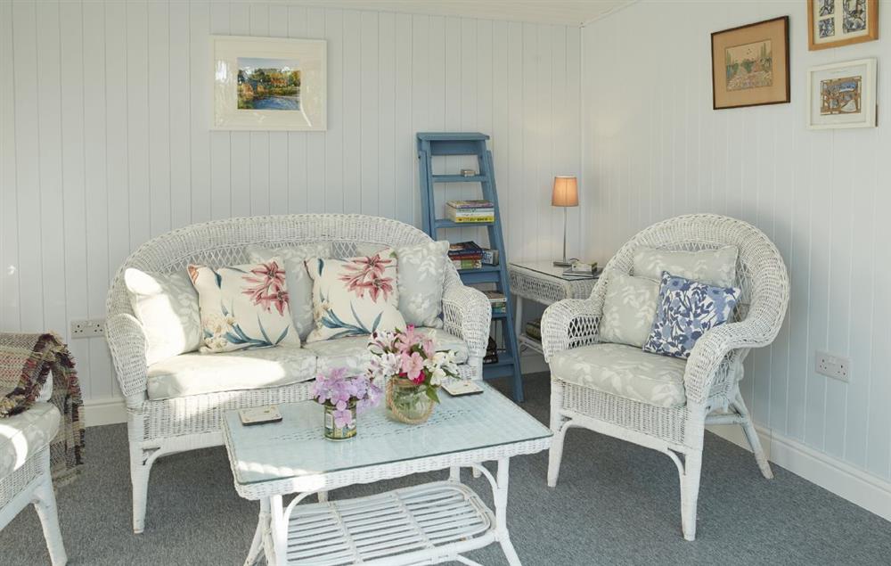 Comfortable furniture in the summer house at Orchard View, Pulverbatch